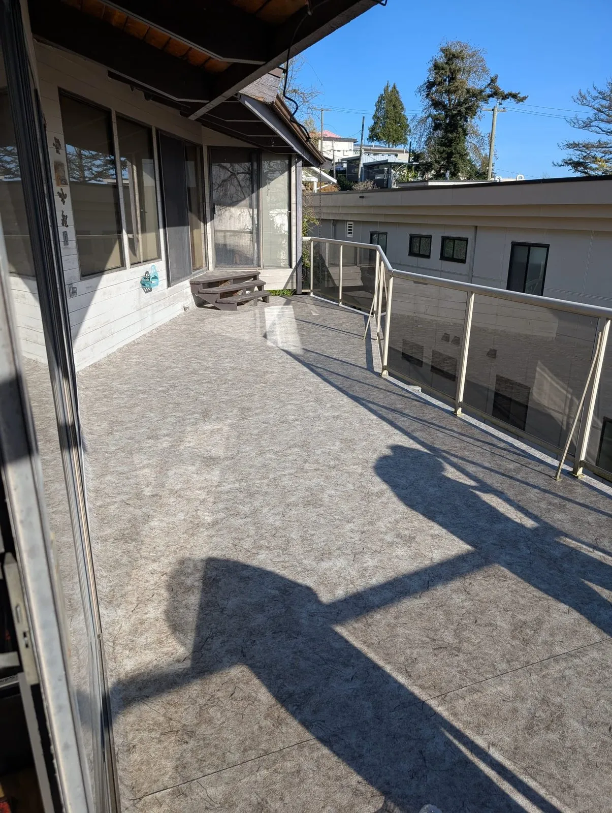 Same sundeck after our team laid a new vinyl membrane across the full surface